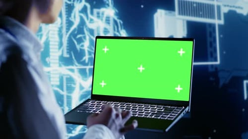 AI Script Coding on Chroma Key Laptop