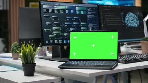 Laptop with chroma key in office interior