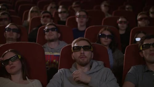 Spectators In 3d Glasses Watching Film In Cinema. People Watching Film At Movie Theatre. 3d Movie...