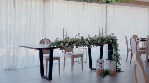 Elegant Wedding Table Setting with White Flowers