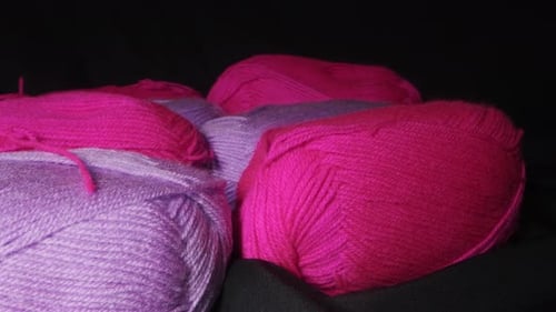 Yarn for Knitting A Ball of Thread on a Black Background