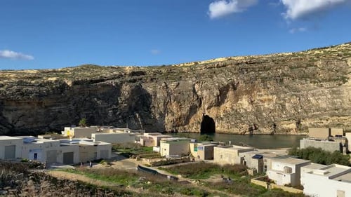 Panning shot of the Dwejra Inland Sea on the island of Gozo, Malta, close to Blue Hole