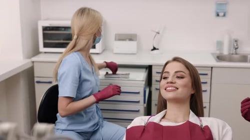 Dentist Prepares Tools for Patient in Clinic