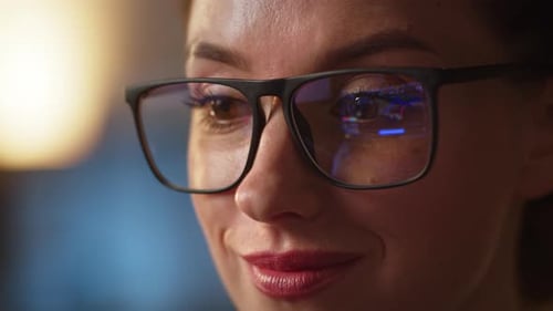 Close Up Shot of Nervous Business Lady Control the Stocks Market Updates in Eyeglasses Reflection