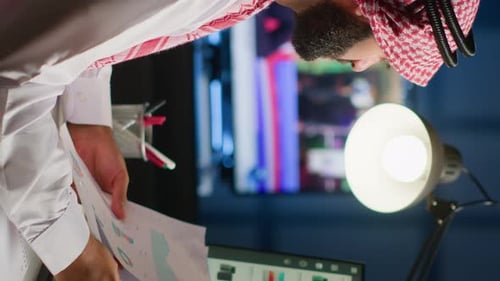 Man Works in Office at Night