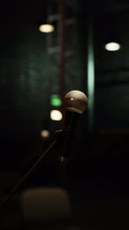 Rotating Microphone On Stage With Atmospheric Lighting