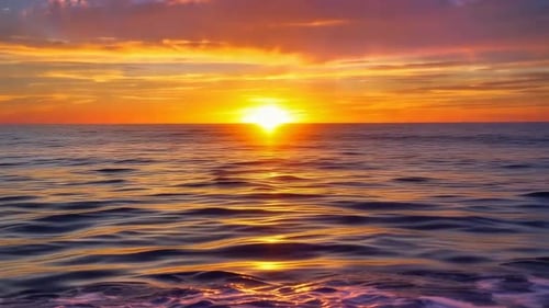 Vibrant golden sunset over rhythmic ocean waves with a purpl