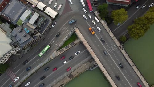 High Angle Aerial View of Busy Urban Bridge Traffic Intersection