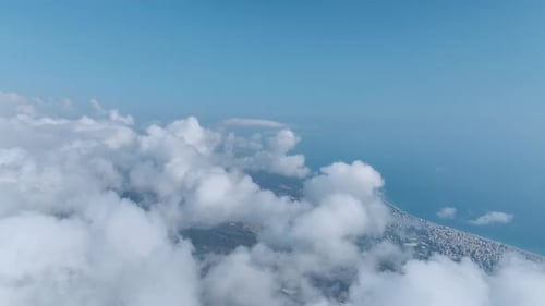 Aerial View Cloudy Sky Above a Serene Forest in the High Mountains