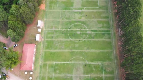 Aerial View of People Playing Soccer on Field