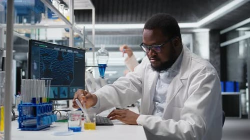 Scientists Conduct Research in Modern Laboratory Setting