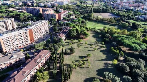 Aerial View of a Modern Residential Area Next to a Park in Rome Italy