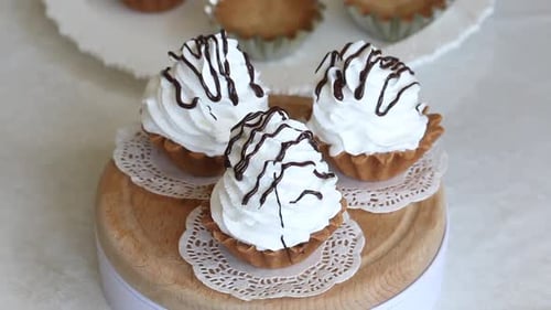 Cake Basket With Chocolate And Butter Cream. Rotates On The Subject Table. Close Up