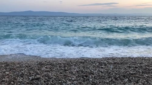 Beautiful Sea Waves Crash Against the Shore Sea Swell with Blue Water
