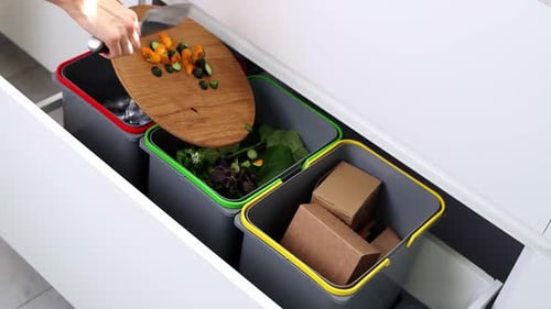 Concept of waste separation and recycling.Modern kitchen waste management and waste disposal at home