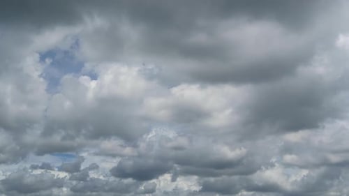 Clouds Float gently in Blue Sky