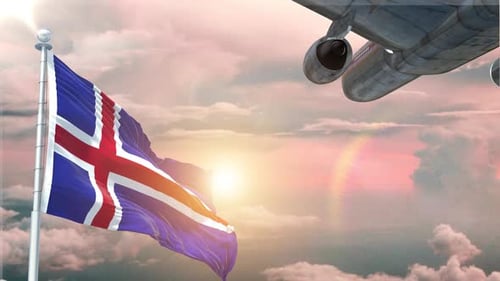 Icelandic Flag Waving with Airplane Flying in Golden Hour Sky