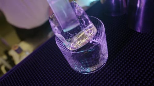 Bartender Add Ice to Glass Bar or Restaurant Top View