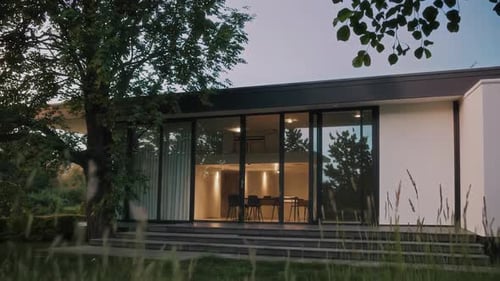 Modern Minimalist Home Exterior with Natural Landscaping