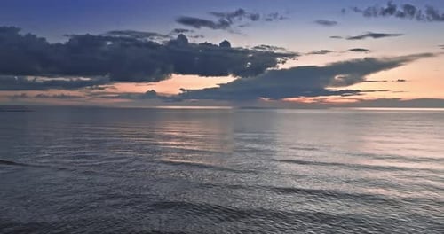 Calm golden sunset over Batlic sea in summer.