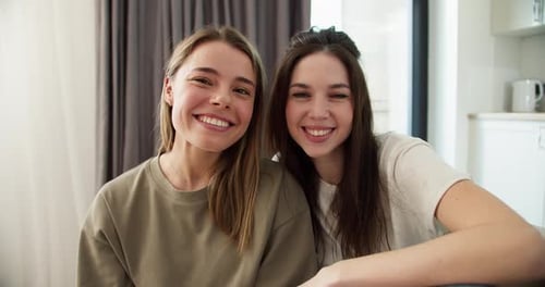 Two Smiling Women Posing Indoors, Happy Friendship
