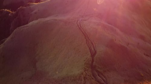 Aerial video of Mount Pulag at sunset with people in the background, the third highest mountain