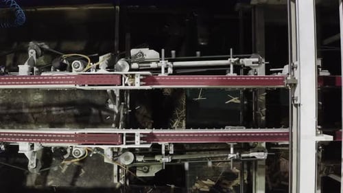 Conveyor Transported Shredded Waste Paper at Plant