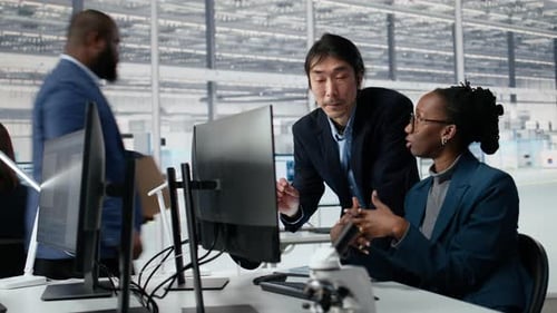 Optimizing Microchip Production AI and Senior Manager with Woman in Factory