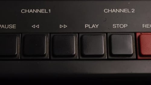 Command Buttons on Professional Reel-to-Reel Audio Recorder, Stopping and Rewinding Tape, Close Up