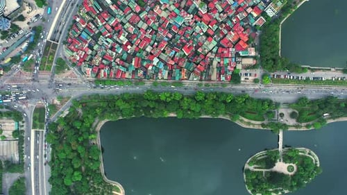 Drone, city and traffic on road, lake and transportation with infrastructure