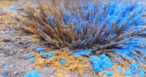 Yellow and Blue Metallic Dust Chips Iron Powder Under the Influence of a Magnetic Field Abstract