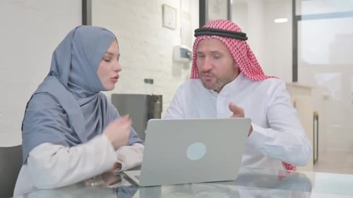 Business Meeting with Laptop in Office