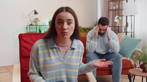 Woman Talking, Man Listening in the Living Room