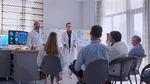 Medical Staff Meeting in Modern Office