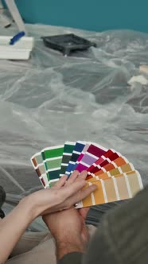 Adults Choosing Paint Colors for a Home Project