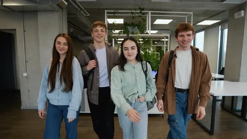 Students Walking Through University Hallway
