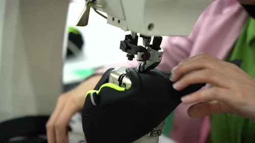 Worker Woman Sewing in Shoe Factory