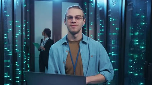 IT Professionals Working In Modern Data Center