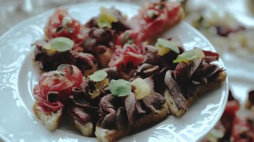 Delicious Plate of Gourmet Meat Appetizers Close Up