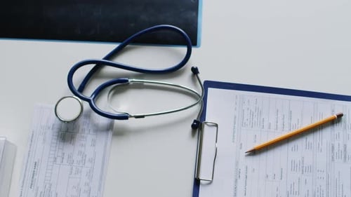 Medical Implements On White Doctor's Table