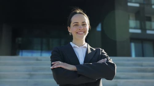 Professional Woman Smiling Confidently Outdoors