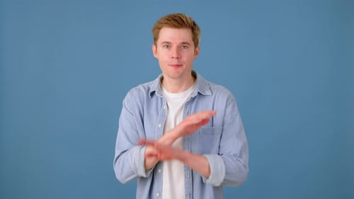 Annoyed Man Making Disagreeing Gesture and Face Expression