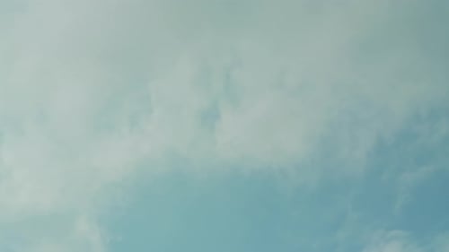 Clouds Drifting Across a Blue Sky Time Lapse