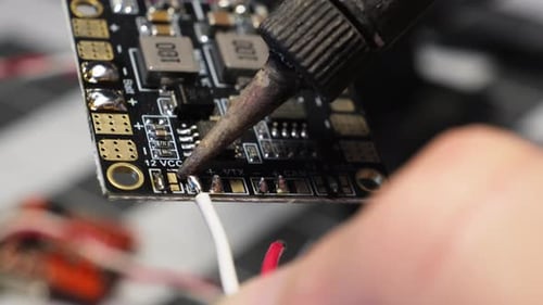 Soldering Wires to Circuit Board, Close Up
