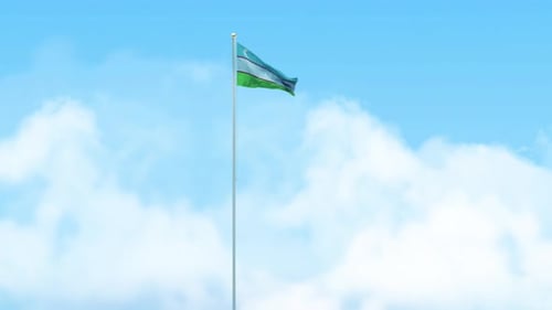 Waving Flag of Uzbekistan Against Blue Sky
