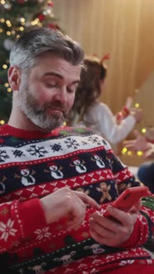 Experience the Cozy Christmas Atmosphere Enhanced By a Festive and Colorful Sweater