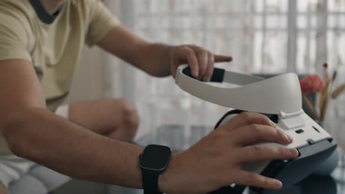 Adult Using VR Headset in Living Room