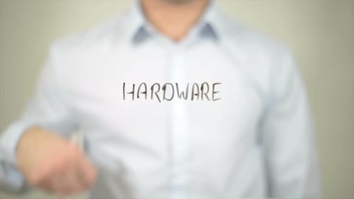 Man Writing Hardware on Clear Surface