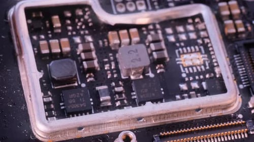 Microprocessors, tracking shot. Computer PC chip microchip blue light close up.