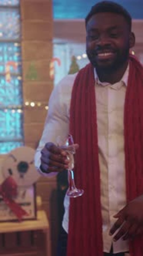 Group of Friends Toasting Champagne at Holiday Party